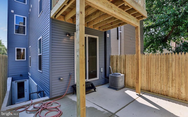 view of patio with central AC