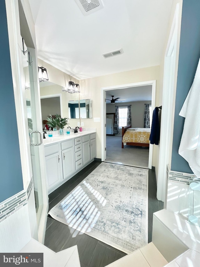 bathroom featuring vanity and ceiling fan