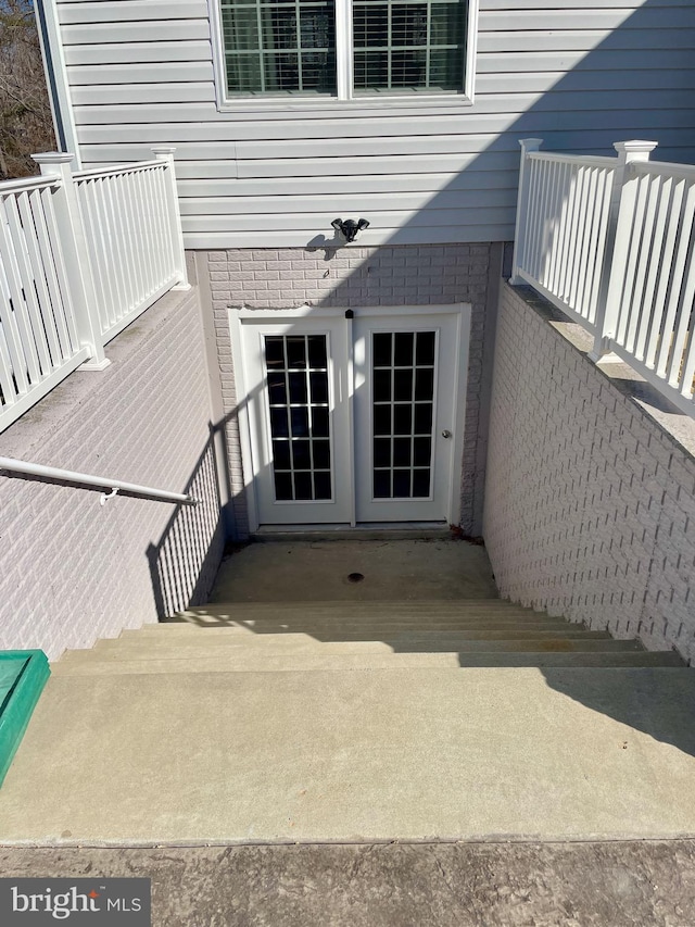 entrance to property with a patio