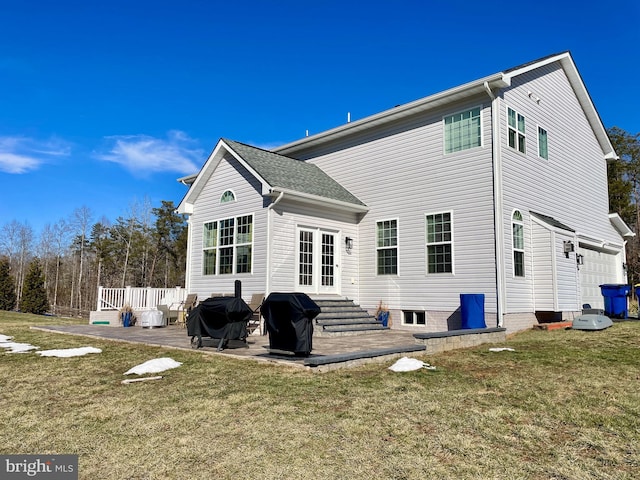 back of house featuring a patio and a yard