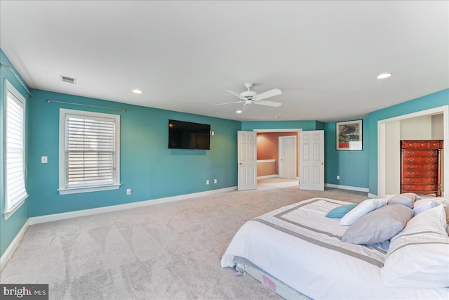 carpeted bedroom featuring ceiling fan