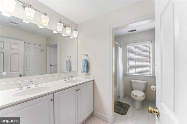 full bathroom with toilet, tile patterned flooring, vanity, and shower / tub combo with curtain