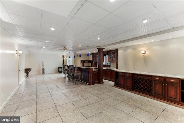 bar featuring ceiling fan and billiards