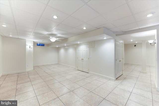 basement featuring ceiling fan