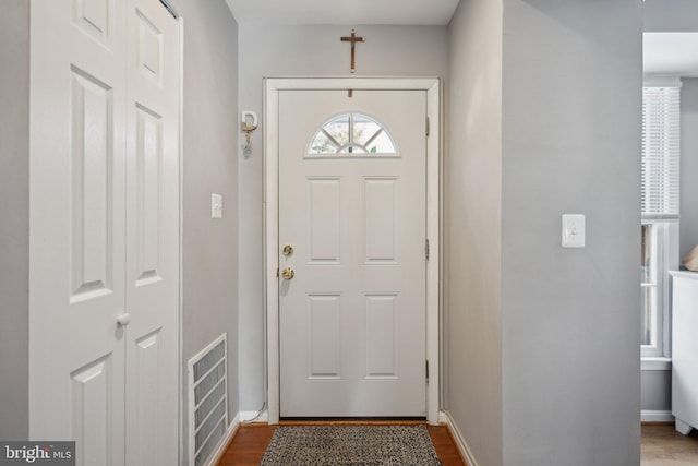 entryway with wood-type flooring