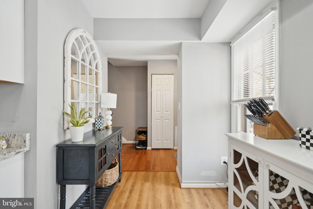 hallway featuring light hardwood / wood-style flooring