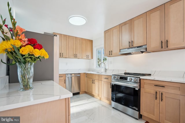 kitchen featuring light stone countertops, sink, light brown cabinets, and appliances with stainless steel finishes