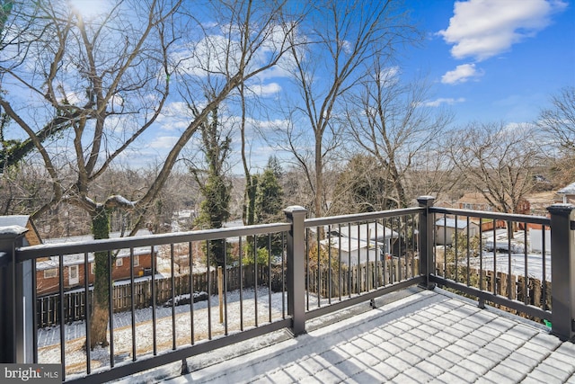 view of snow covered deck