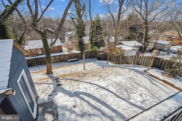 view of yard covered in snow