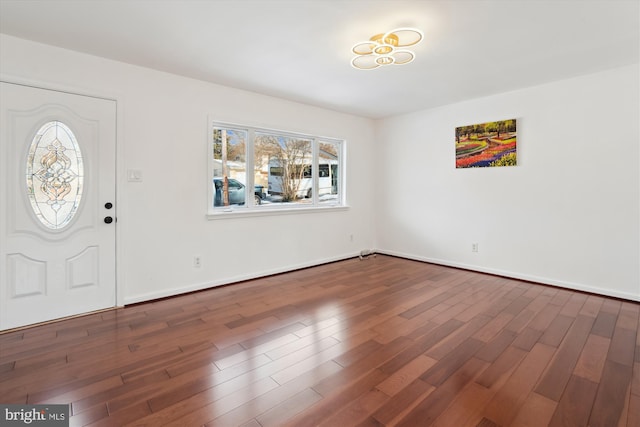 foyer featuring dark wood-type flooring