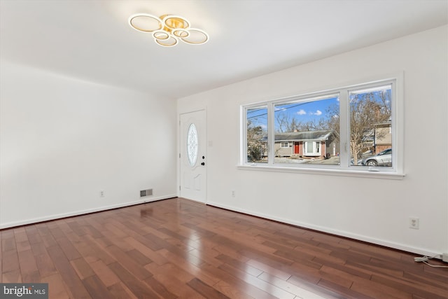 foyer entrance featuring dark hardwood / wood-style flooring