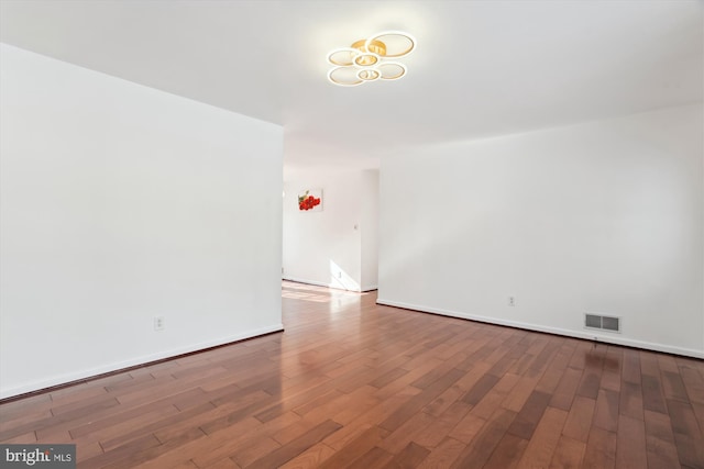 empty room featuring hardwood / wood-style floors