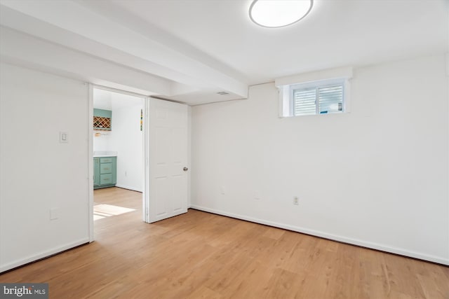 basement featuring light hardwood / wood-style flooring