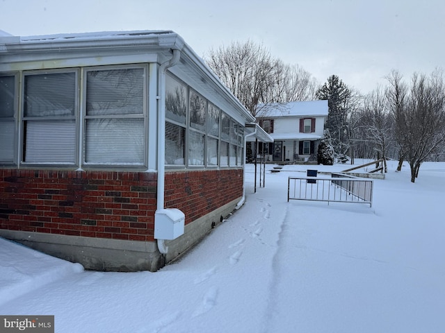 view of snow covered property