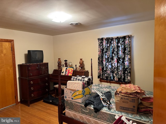 bedroom featuring light wood-type flooring