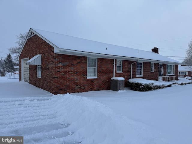 exterior space featuring central AC unit