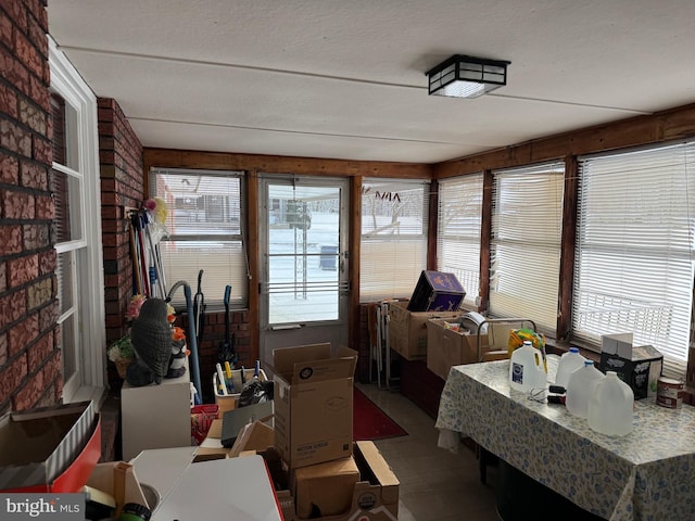 sunroom / solarium featuring a wealth of natural light