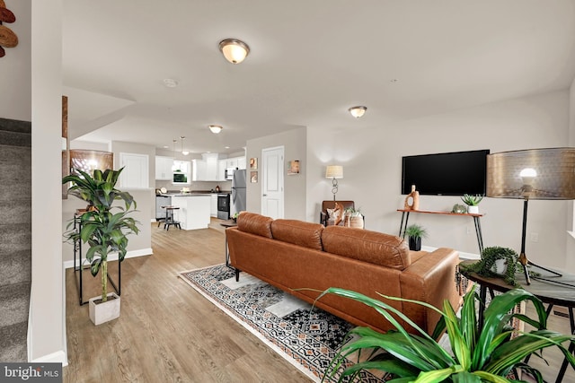 living room featuring light wood-type flooring