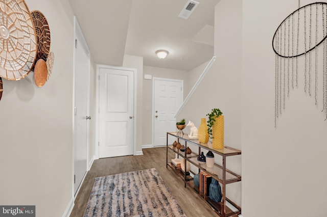 corridor featuring hardwood / wood-style flooring