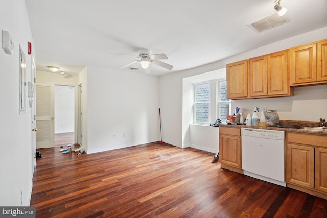 kitchen featuring sink, ceiling fan, white dishwasher, and dark wood-type flooring