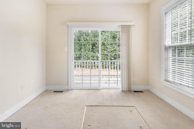 view of carpeted spare room