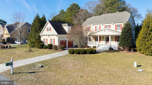 view of front of home featuring a front yard and a porch