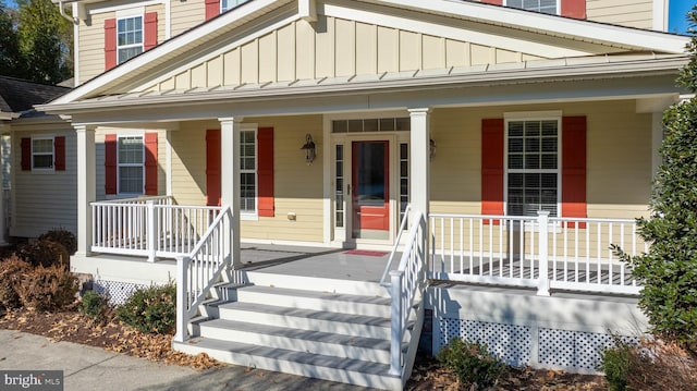 property entrance with covered porch