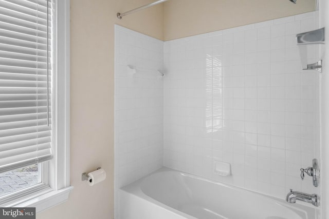 bathroom with shower / washtub combination