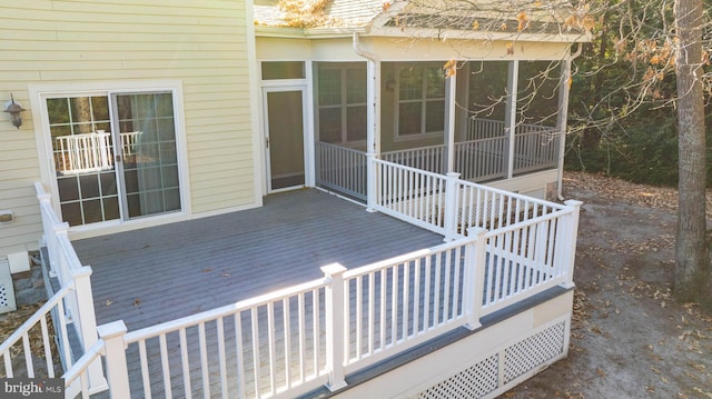 wooden terrace with a sunroom