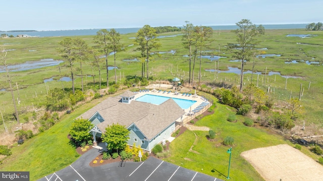 drone / aerial view with a rural view and a water view