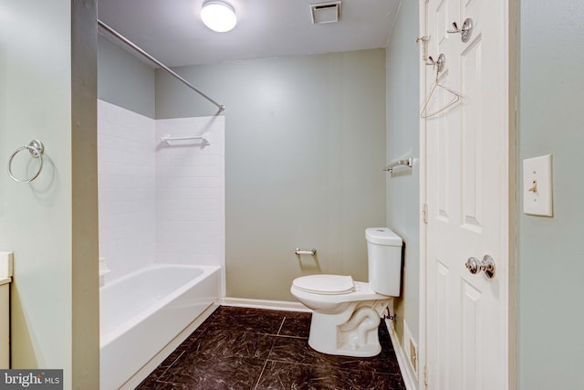 bathroom with shower / bath combination and toilet