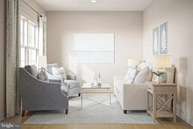 sitting room with light hardwood / wood-style flooring