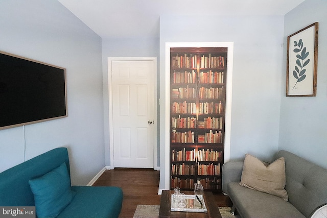 sitting room with dark hardwood / wood-style floors