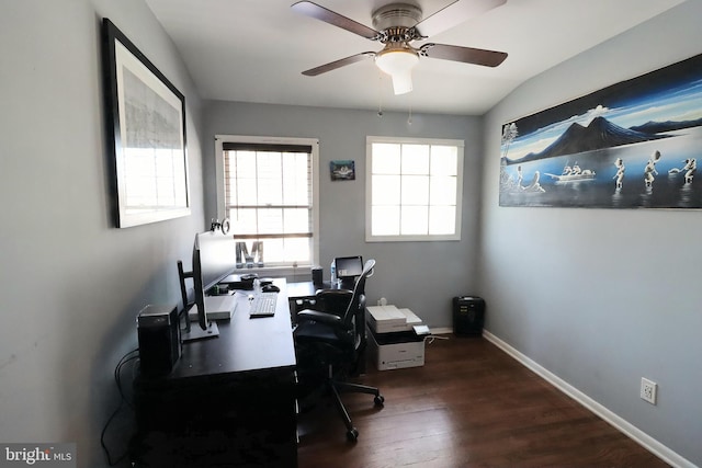 office area featuring ceiling fan, vaulted ceiling, and dark hardwood / wood-style flooring