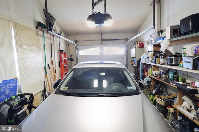 garage featuring a garage door opener