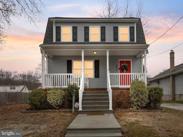 front of property featuring covered porch