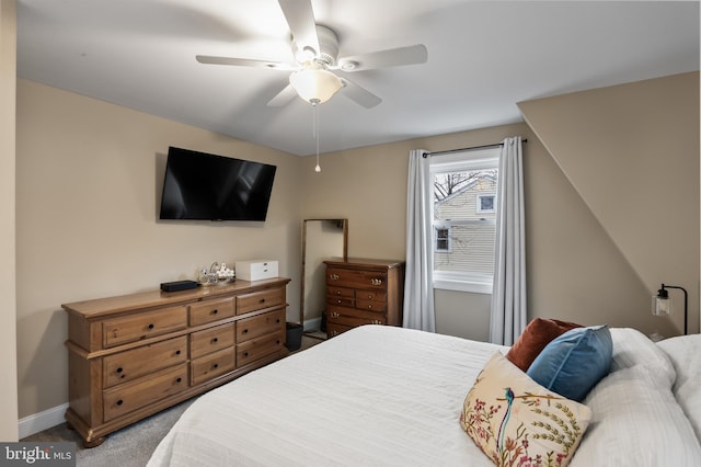 bedroom with ceiling fan and carpet flooring