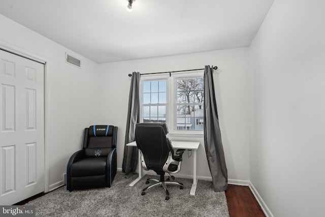 office space with dark hardwood / wood-style floors