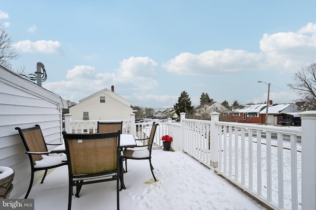 view of snow covered patio