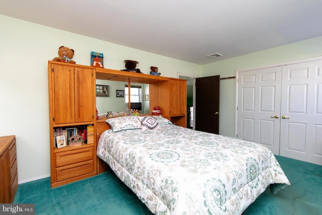 carpeted bedroom with a closet