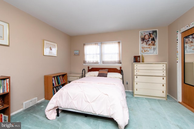 bedroom with light carpet