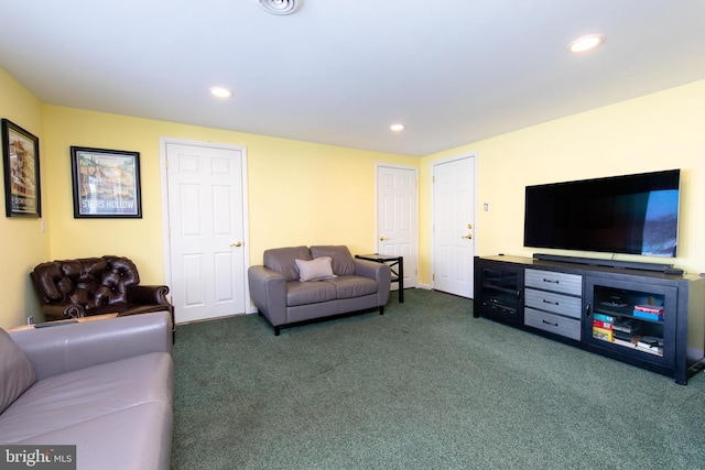 living room with dark carpet