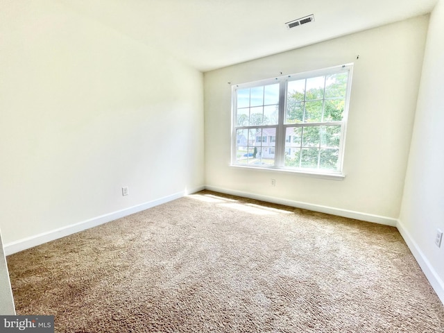 view of carpeted spare room