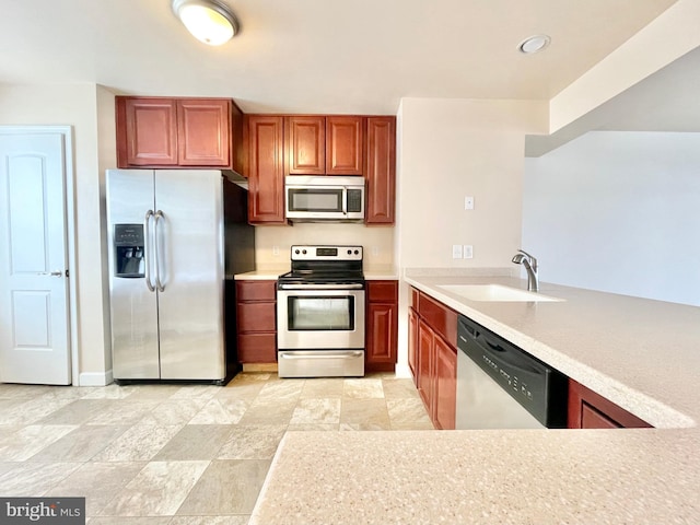 kitchen with sink and stainless steel appliances