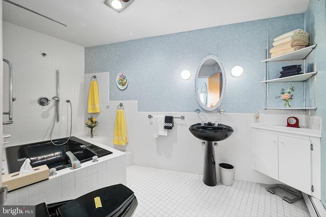 bathroom featuring tile patterned floors, shower with separate bathtub, and tile walls