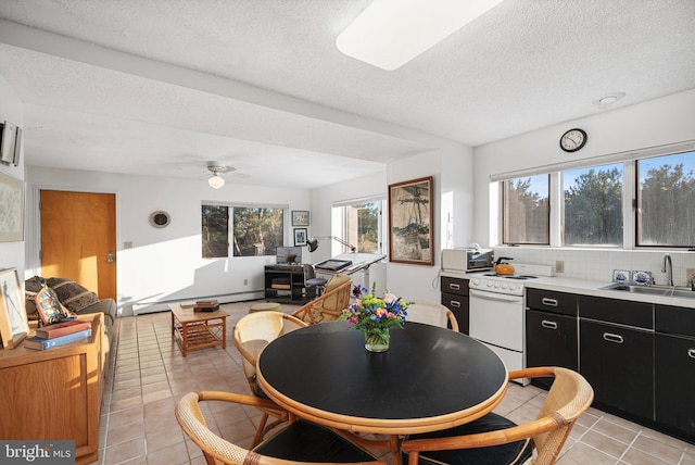 kitchen featuring light tile patterned flooring, sink, backsplash, white electric range oven, and baseboard heating