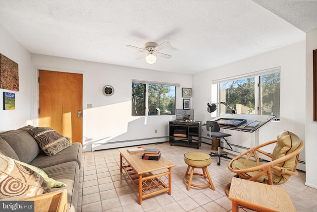 living room featuring ceiling fan, light tile patterned floors, a textured ceiling, and baseboard heating