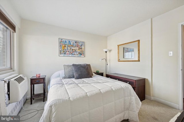 bedroom featuring baseboards and light colored carpet