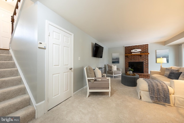 carpeted living room with a fireplace