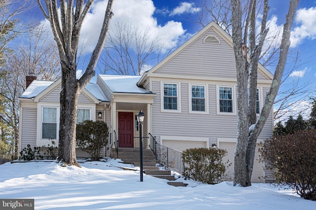 view of front of home with a garage